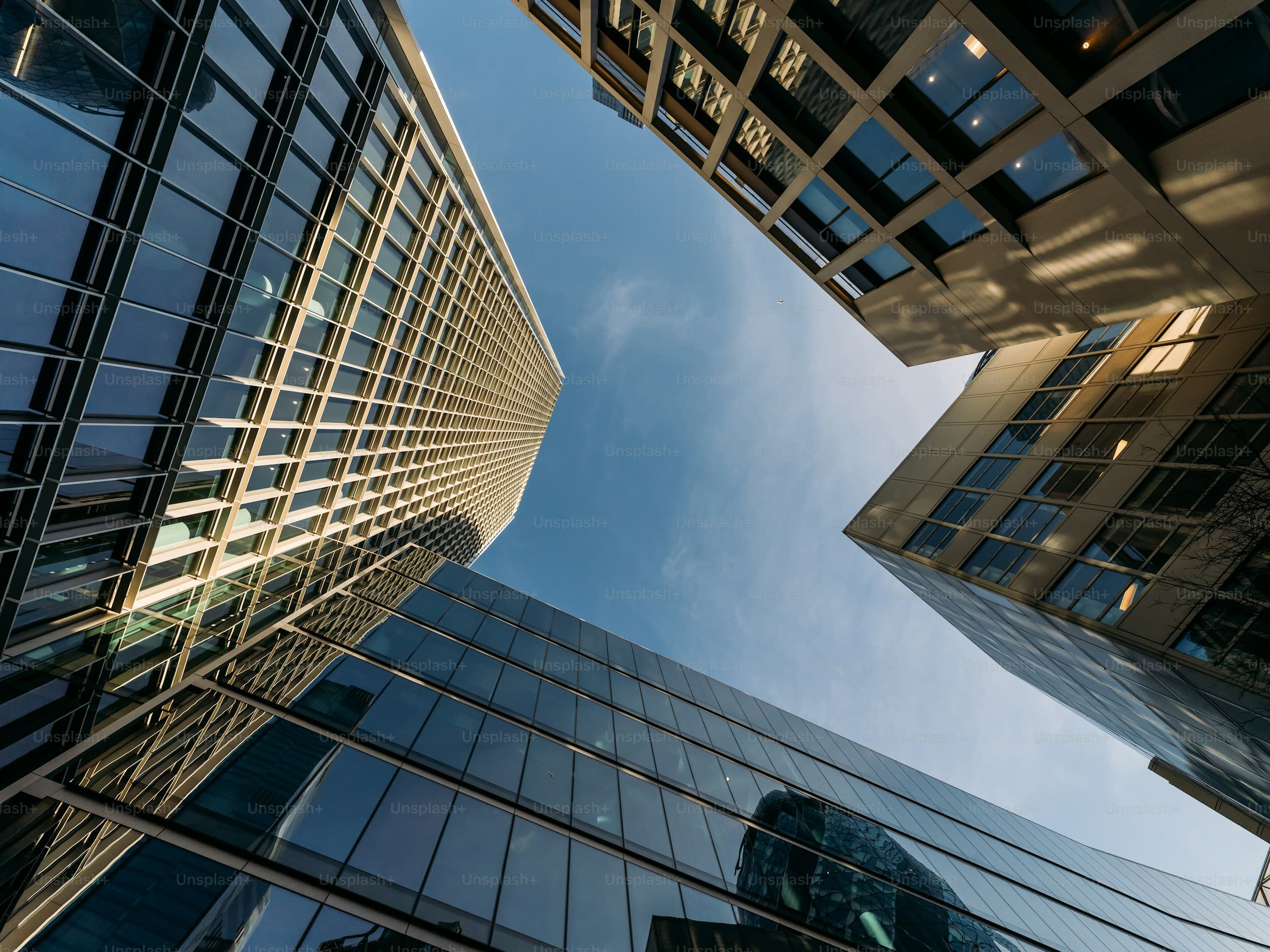 Corporate building snapped from below with a clear blue sky in the background